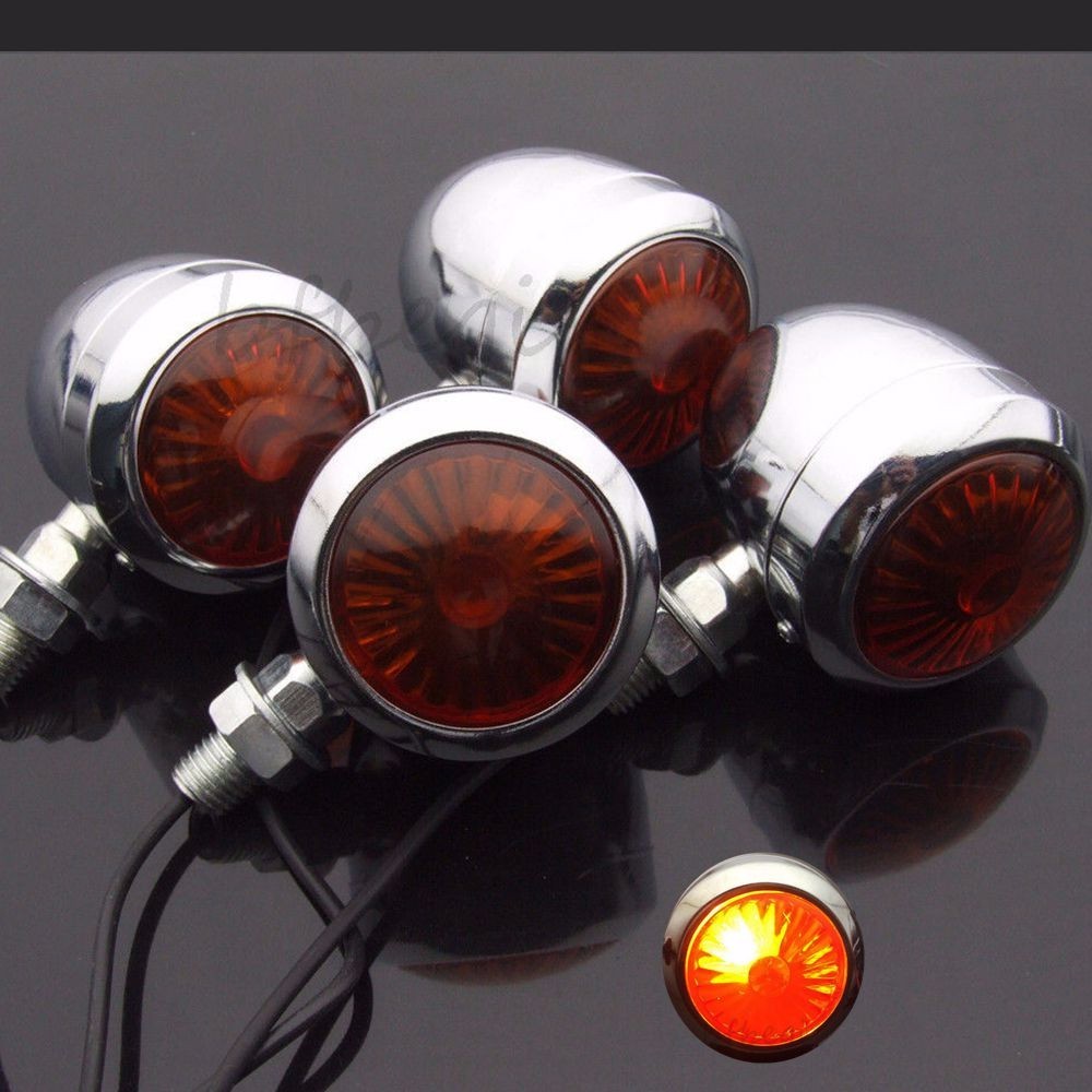2 pieces of chrome motorcycle amber flashing lights, brakes, running lights, turn signals, and round taillights