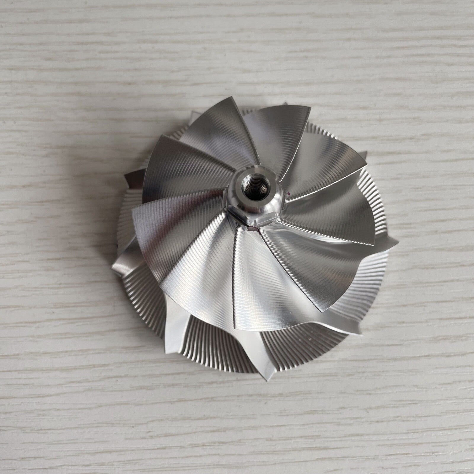 TD05 Forward 64.40/86.00 mm 9+0 Insert Point Milling Compressor Wheel