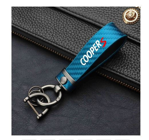 Black leather horseshoe buckle accessory for Audi Q8 car keychain/key ring.
