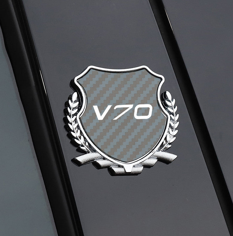 Carbon-plated side fender and window badge stickers for Volvo C70 cars.