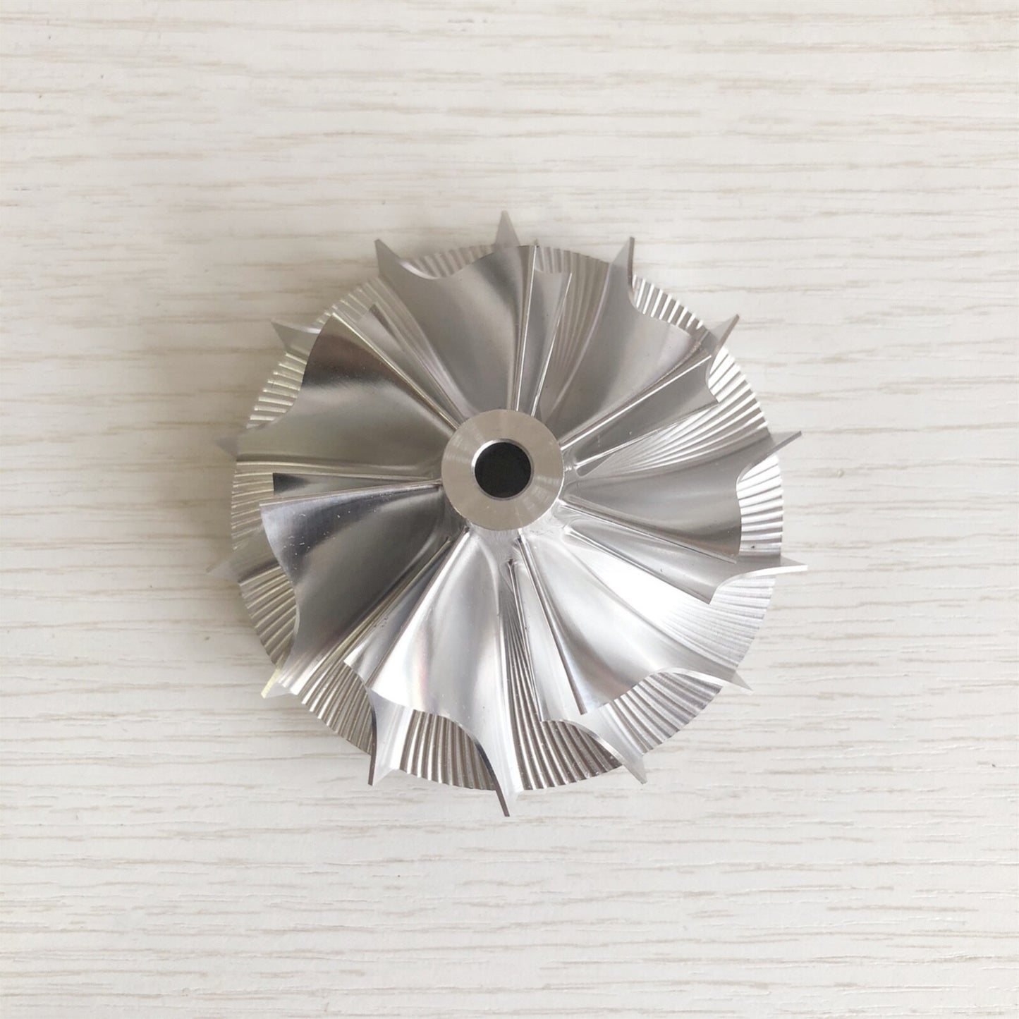 T04S 409535-0007 57.10/76.07mm 7+7blades Performance billet compressor wheel
