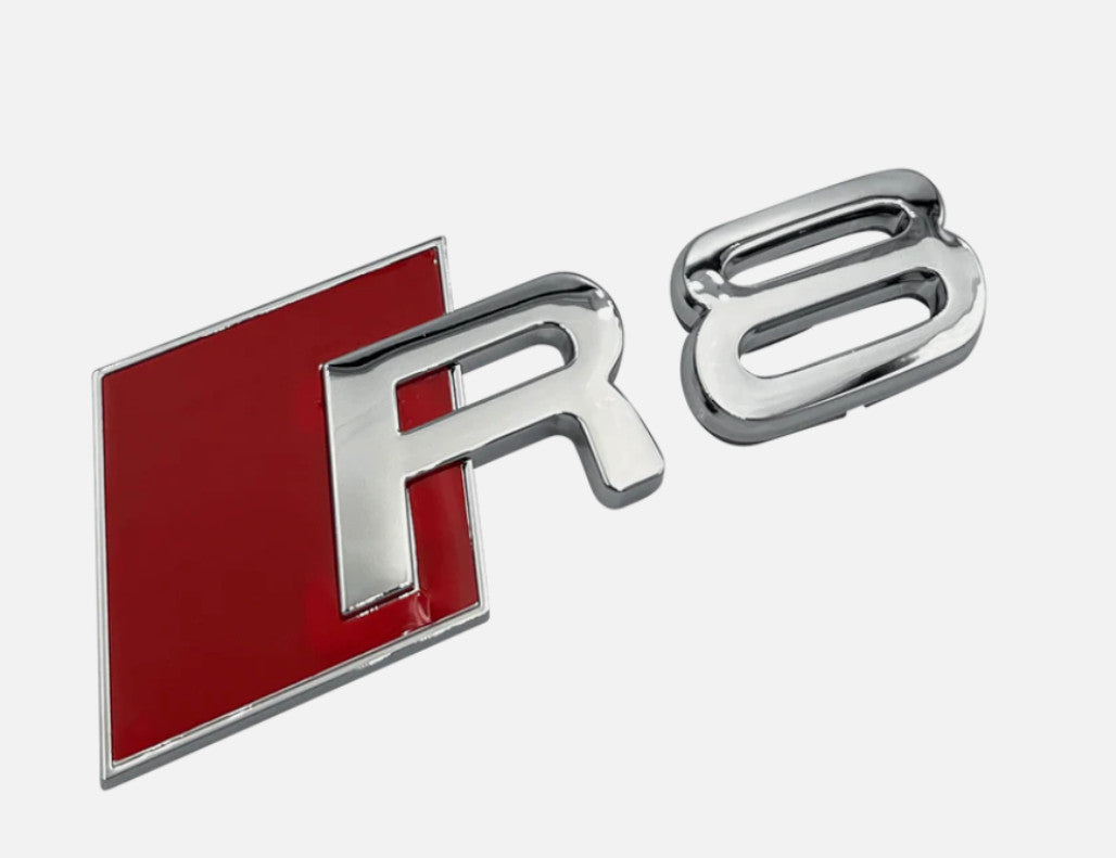 Chrome-plated decals for Audi R8 front and rear ring trunk badges and boots.