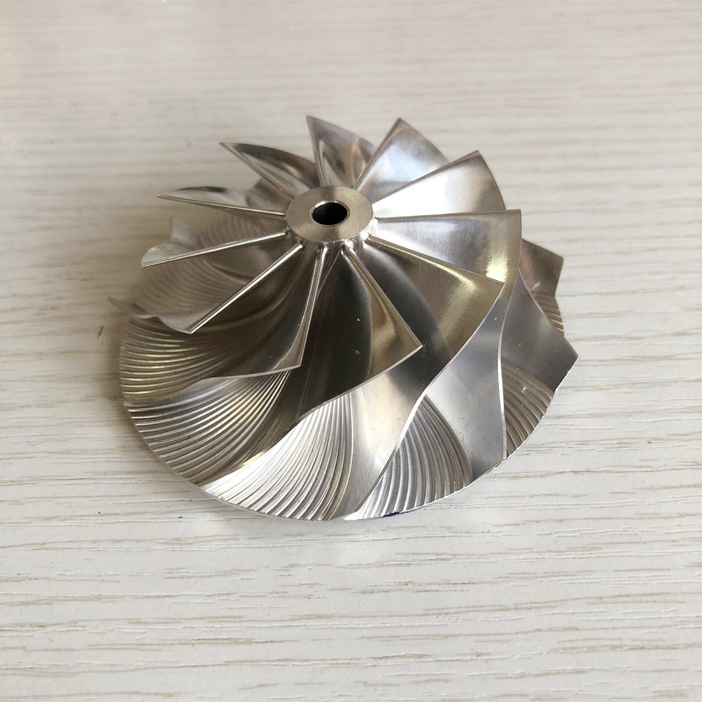 K16 Reverse 59.00/78.00 mm 11+0 Blade Turbine Milling Compressor Wheel