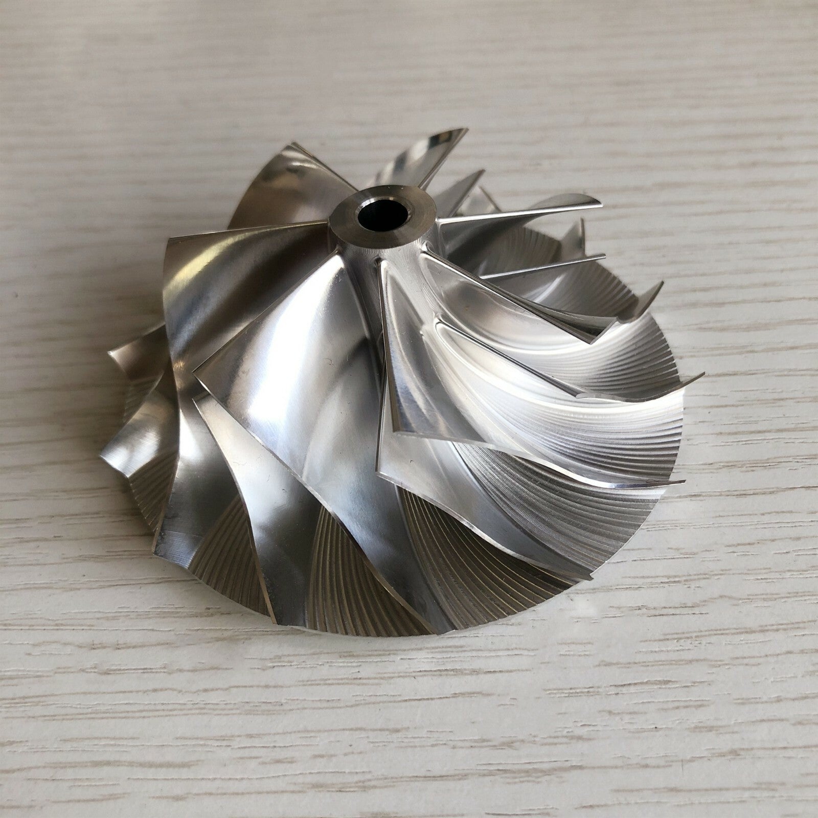 TD06 62.30/86.15 mm 7+7 Blade High-Performance Turbine Billet Compressor Wheel